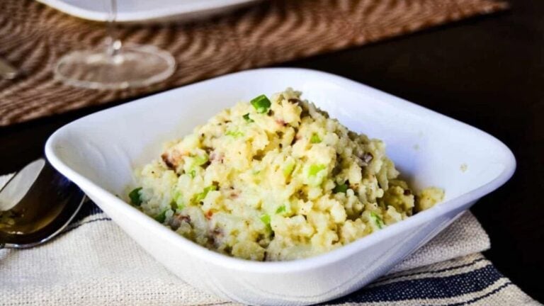 Loaded cauliflower mash in a bowl.