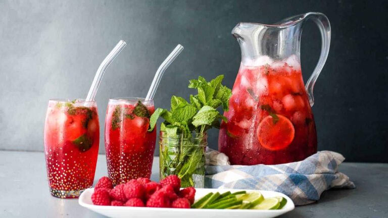 Raspberry mojito cocktails with a mojito party pitcher.