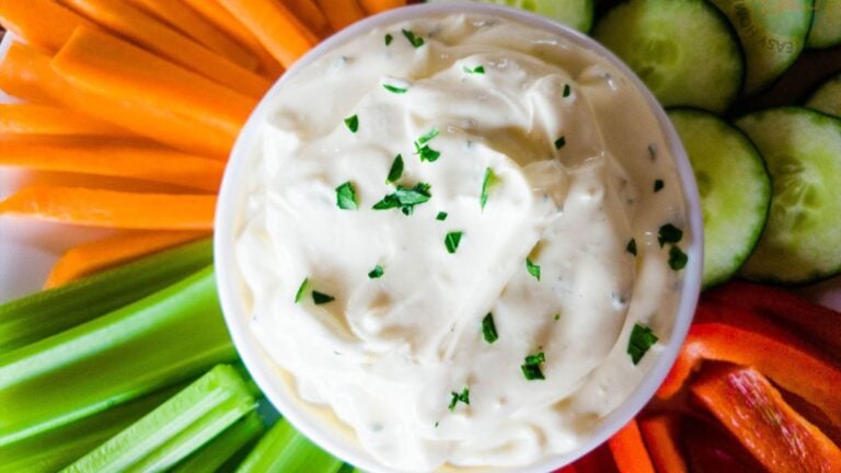 A picture of easy 3-Ingredient Onion Dip with vegetable sticks.