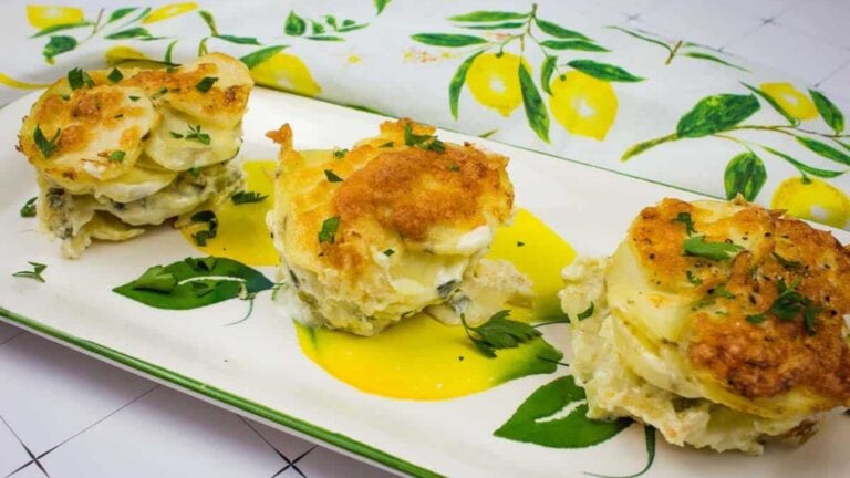 Au Gratin Potato Stacks on a white plate.