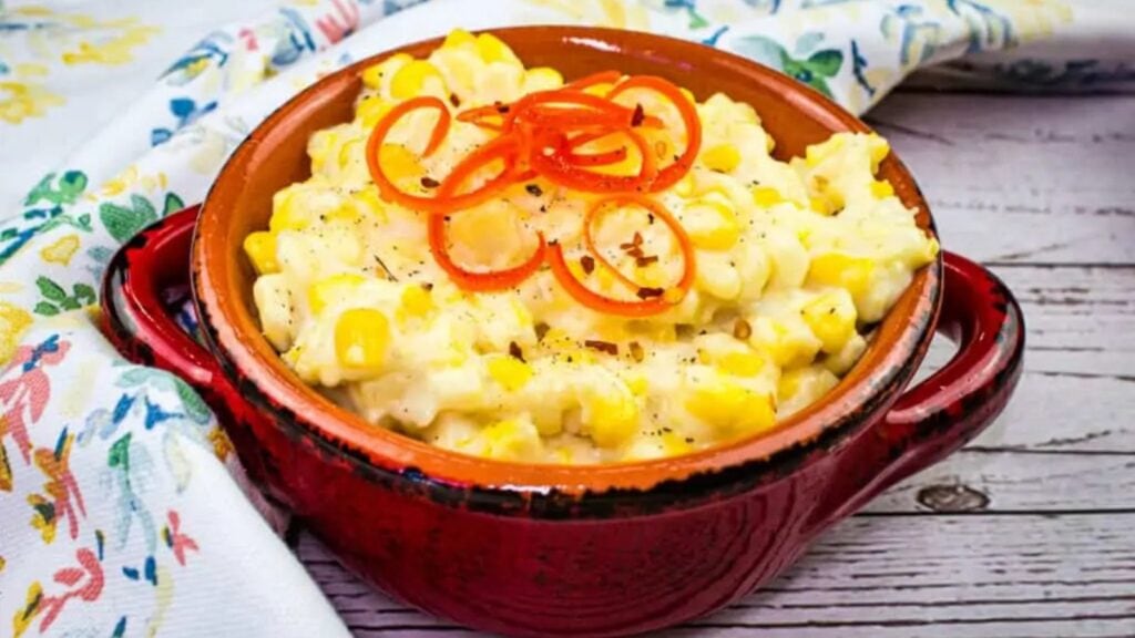 Smoked Creamed Corn in a black skillet.
