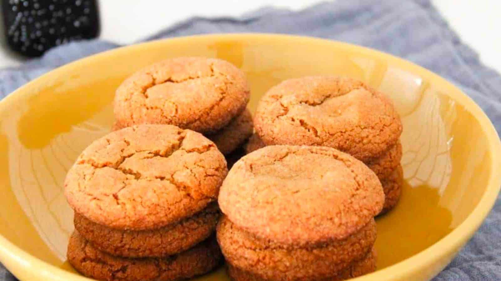 Grandma's molasses cookies in a yellow dish.