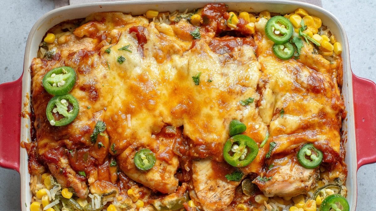 Chicken enchilada casserole with corn and jalapenos.