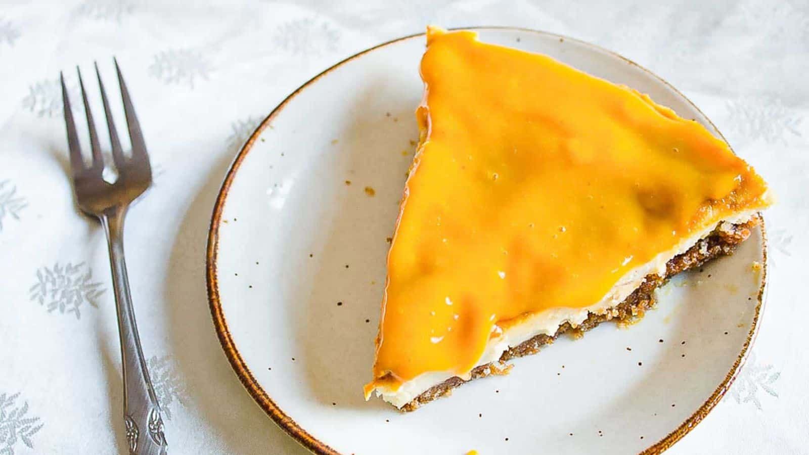Lemon mango cheesecake slice.