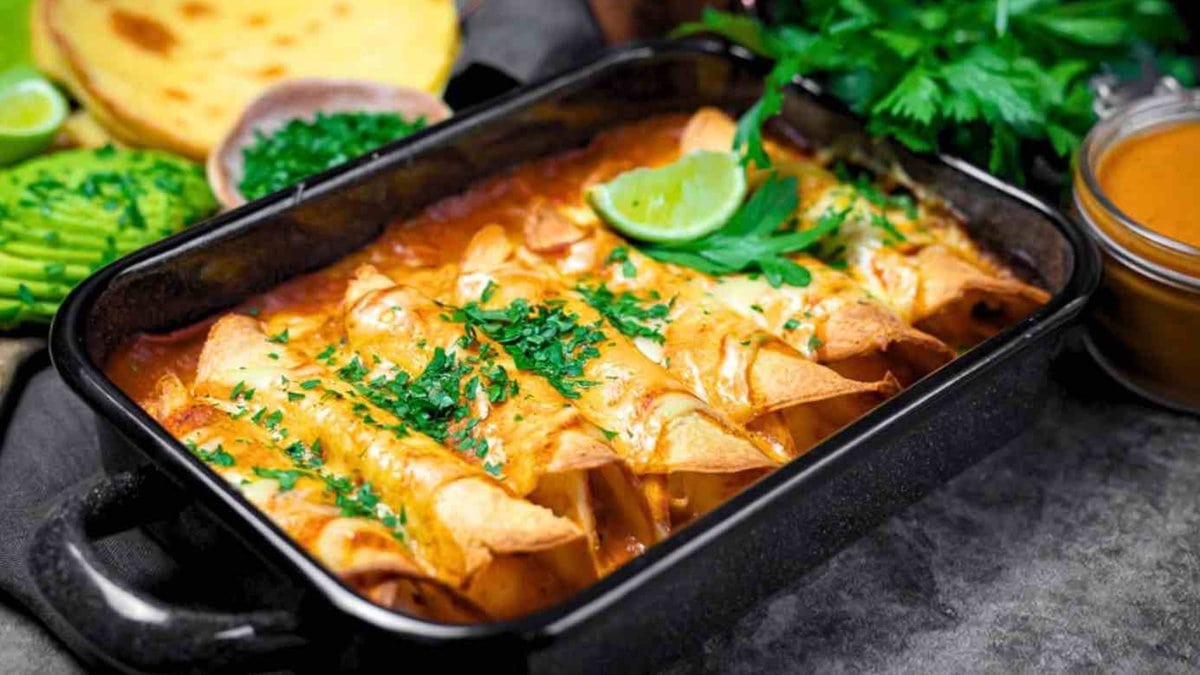 Mexican enchiladas in a baking dish.