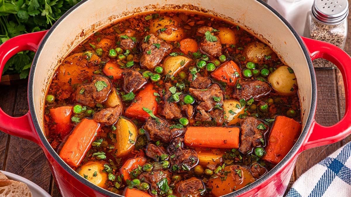 Hearty lamb stew with carrots and potatoes in a rich broth.
